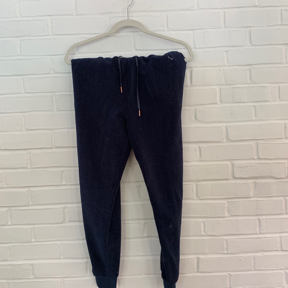 Kendall and Kylie blue ripped sweatpants